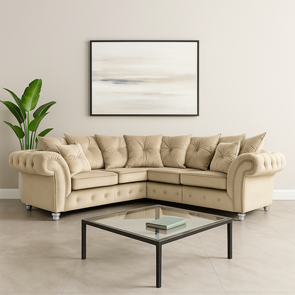 Pebble sectional sofa in a living room with a coffee table and abstract art on the wall.
