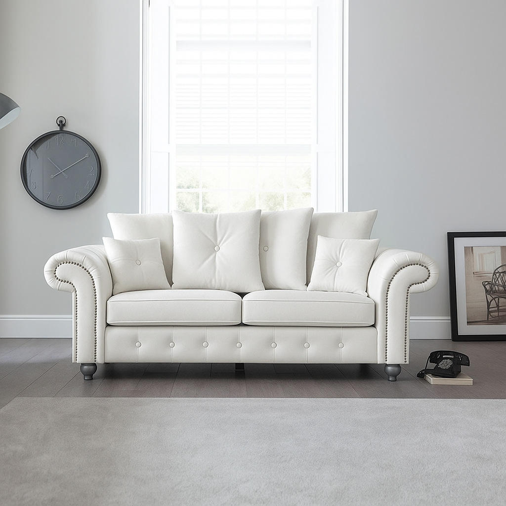 Elegant Leather Ashwin 3-Seater Sofa in Cream — Modern Chesterfield design with button detailing and plush cushions in a bright living room