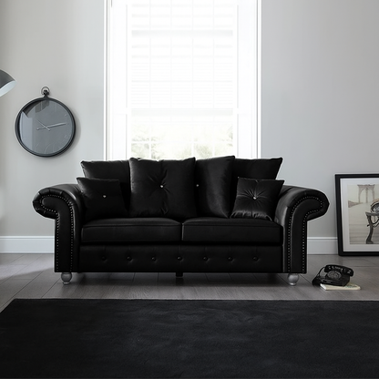 Elegant Leather Ashwin 3-Seater Sofa in Black— Modern Chesterfield design with button detailing and plush cushions in a bright living room
