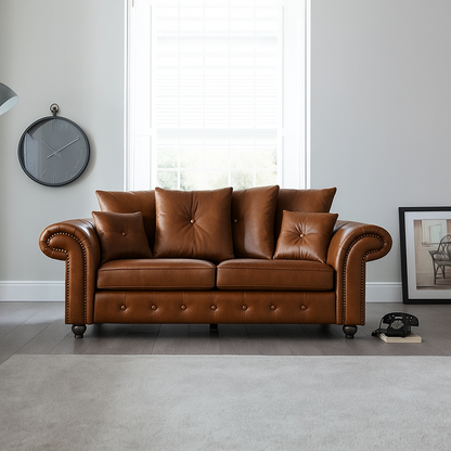 Elegant Leather Ashwin 3-Seater Sofa in Brown — Modern Chesterfield design with button detailing and plush cushions in a bright living room