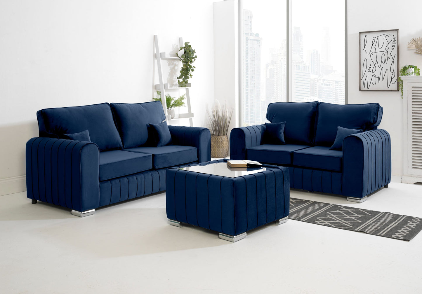 Navy blue sofa set in a modern living room with a coffee table.