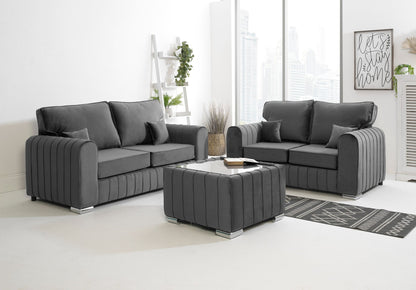 steel sectional sofa set in a modern living room with a coffee table.
